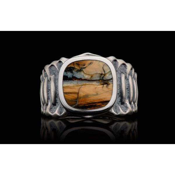 Echelon Ring with Mammoth tooth inlay. The body is beautifully sculpted in Sterling Silver, with a side pattern inspired by the  Hudson Valley Goldsmith New Paltz, NY