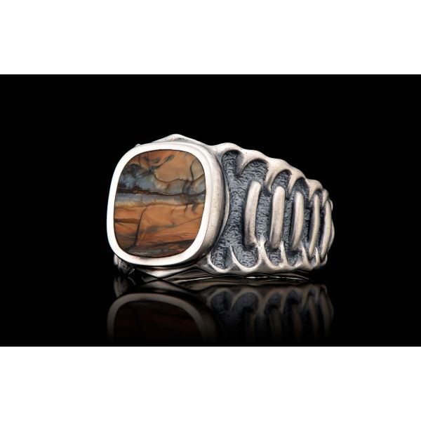 Echelon Ring with Mammoth tooth inlay. The body is beautifully sculpted in Sterling Silver, with a side pattern inspired by the  Image 2 Hudson Valley Goldsmith New Paltz, NY