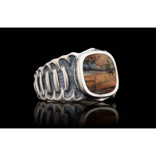 Echelon Ring with Mammoth tooth inlay. The body is beautifully sculpted in Sterling Silver, with a side pattern inspired by the  Image 3 Hudson Valley Goldsmith New Paltz, NY