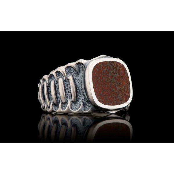 Echelon Ring with Dinosaur Bone inlay. The body is beautifully sculpted in Sterling Silver, with a side pattern inspired by the  Image 2 Hudson Valley Goldsmith New Paltz, NY