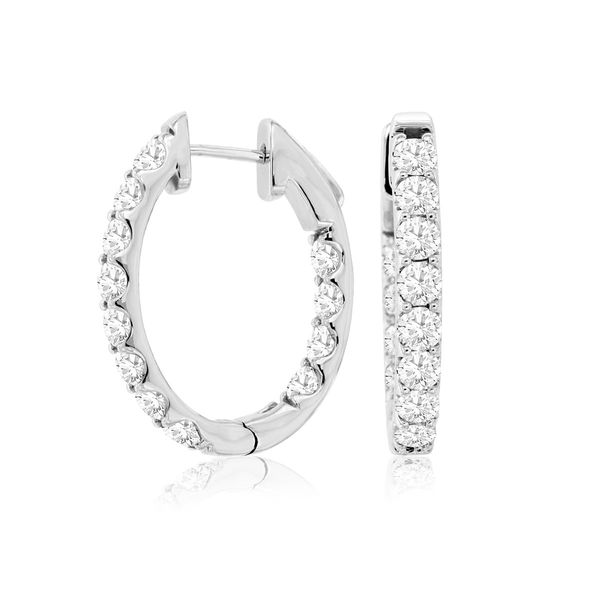 One of the basics that every woman needs in her jewelry collection!  These gorgeous 14 kt white gold diamond in/out hoops loo