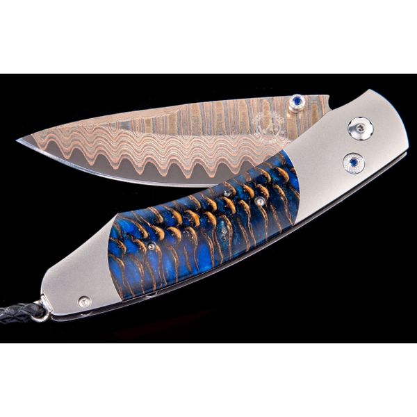 William Henry pocket knife with pine cone in handle 