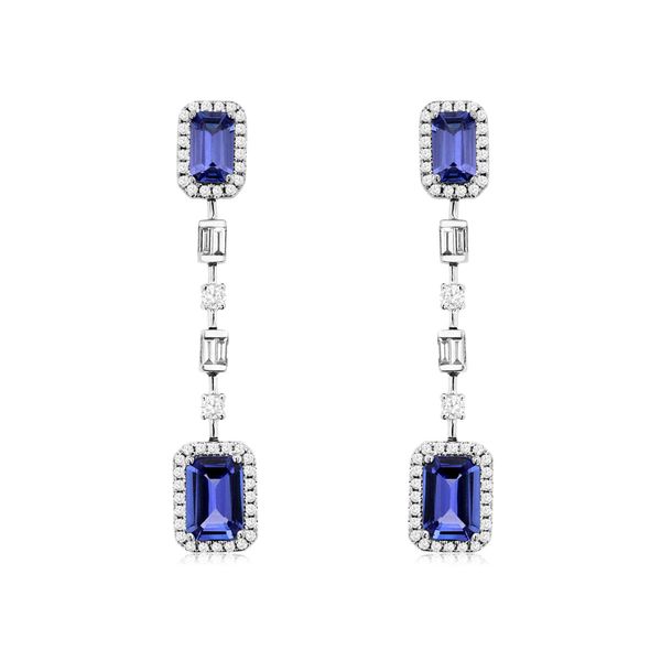These earrings are to die for!!  These 14 kt white gold earrings feature 2 emerald cut Tanzanites dangling with 4 diamond (2 