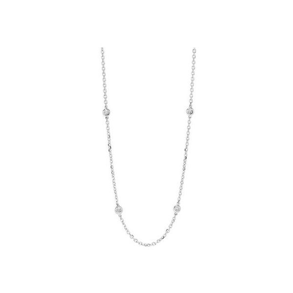 Designed in a high shine finish, this fashionable, brightly polished 14k white gold chain layering necklace is perfect for pa