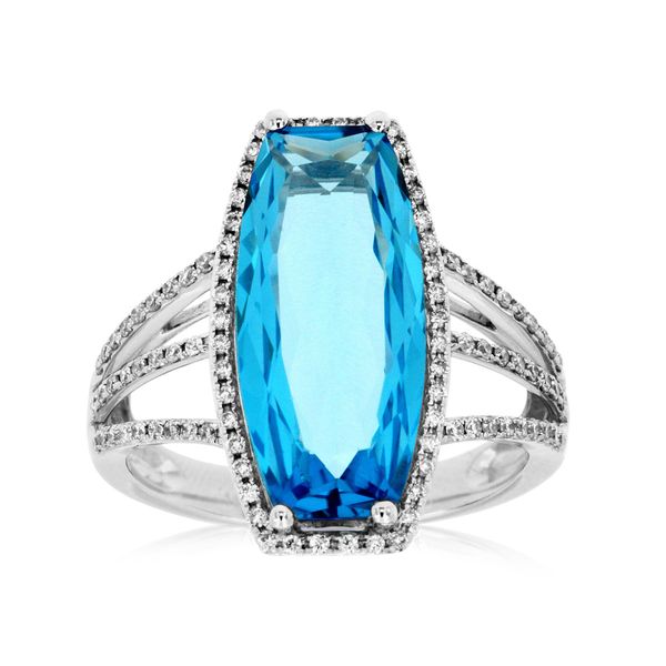 This ring is a showstopper.  This beautiful elongated 6.80 carat blue topaz is surrounded by a halo of diamonds totaling .31 