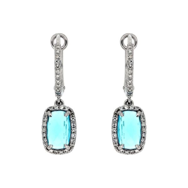 Spectacular is the only word to describe these beauties!  These 14 kt white gold earrings feature elongated cushion-cut blue 