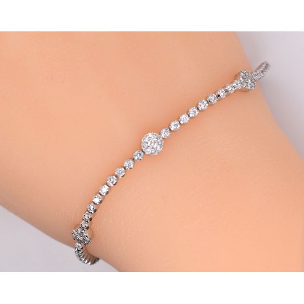 This is not your ordinary tennis bracelet!!  This 2.0 carat diamond  total weight bracelet is just a little extra on the DAZZ