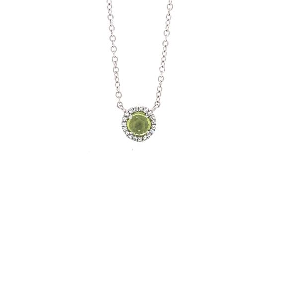 Such a lovely necklace!!  Peridot is the birthstone for August.  This .31 carat round peridot is surrounded by .05 round diam