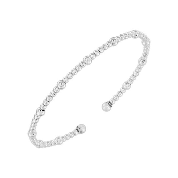 Sterling silver smaller bead silver cuff with larger silver beads. This bracelet is an open bangle sized to fit small to medi