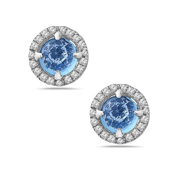 We love these simple earrings! Each earring features a round blue topaz  of approximately .34 carats and each is surrounded b