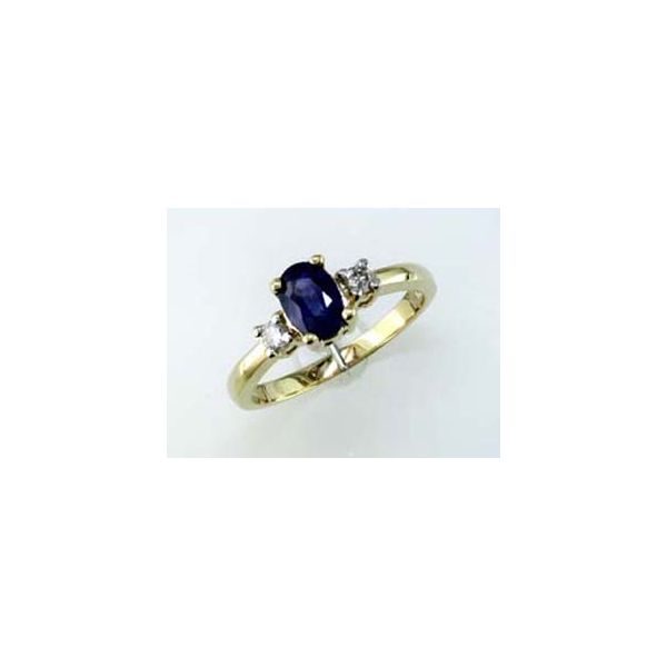 The perfect September birthstone ring. This 1.0 carat sapphire is set in lovely 14 kt yellow gold and is accented with .12 to