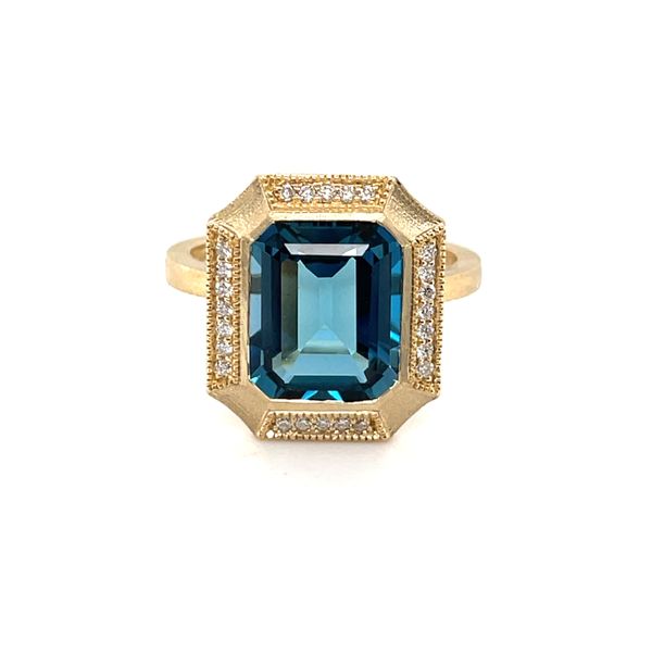 STUNNING is the best word to describe this ring!!  This rectangle-shaped 4.21 carat London blue topaz ring with .12 carat dia