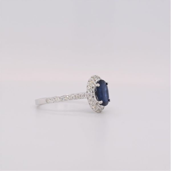 Sapphire is the birthstone for September. This 14 kt white gold ring features a 1.40 carat oval sapphire with .50 total diamo