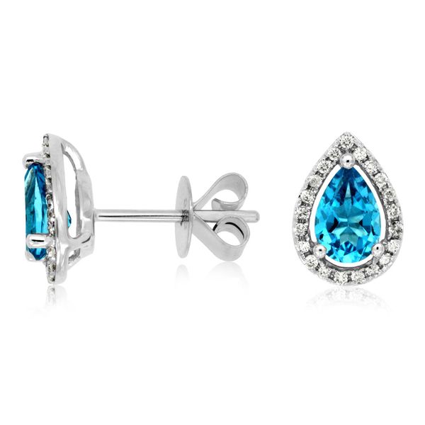 These are fabulous!! This 14 kt white gold set of earrings features a pear-shaped blue topaz stone surrounded by a halo of di