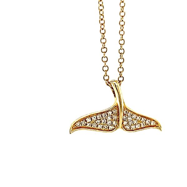 Some of us call it a whale tale and some of us call it a mermaid tail. We ay, let it be whatever you prefer. This 14 kt yello