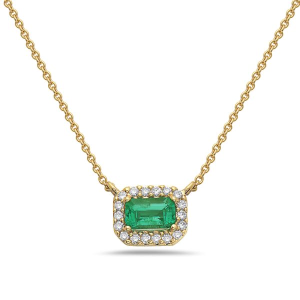 So in LOVE with this emerald and diamond necklace. This 14 kt yellow gold 18 inch chain features a .26 carat emerald cut emer