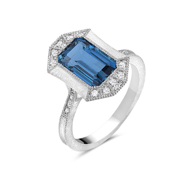 This vintage-inspired ring is fabulous!! Set in 14 kt white gold, this elongated, rectangle set 2.69 carat London blue topaz 