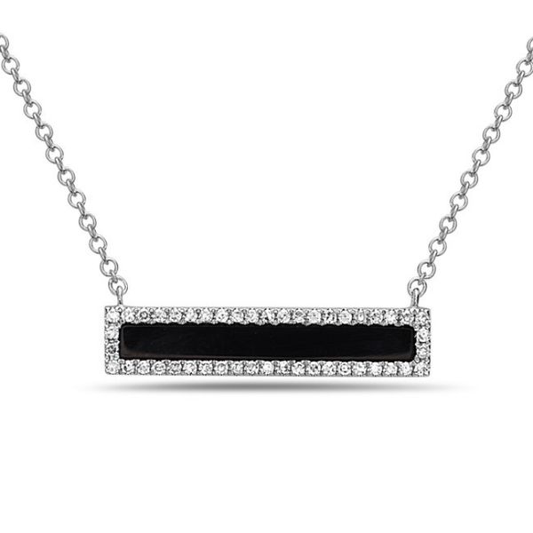 This necklace is a must add to your jewelry collection!! It features a .50 baguette-shaped black onyx surrounded by 46 round 