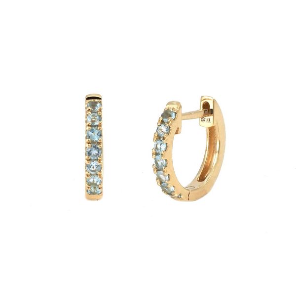 14 kt Yellow Gold Blue Topaz Huggie Hoops featuring 0.26 carat gemstone. This hoop is 10.2 mm in size and the gemstones go ap