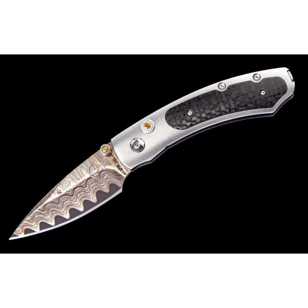 William Henry fervor series knife with Damascus steel blade and carbon fiber handle inlay