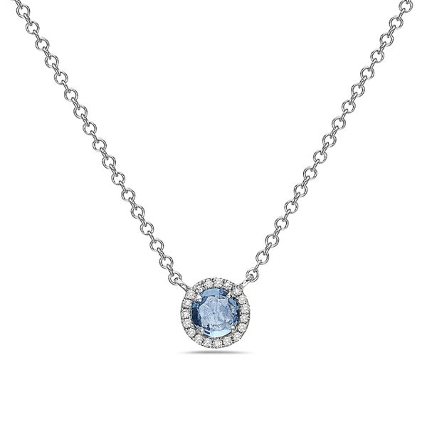 Such a beauty!! This 14 kt white gold 18 inch necklace features a beautiful .38 carat round blue topaz  surrounded by 19 roun