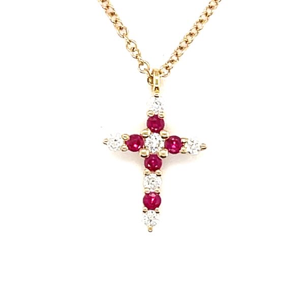 We are in love with this beautiful cross necklace! It features 5 round rubies totaling .13 carats and 6 round diamonds totali