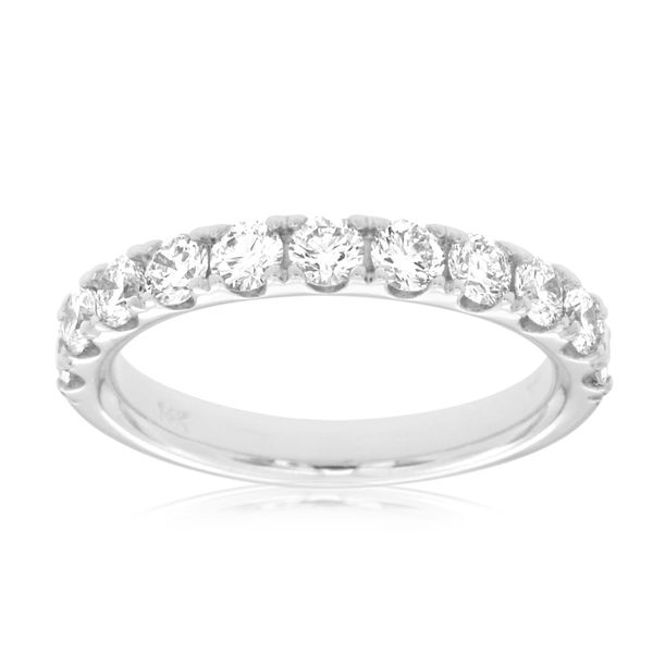 This gorgeous 14 kt white gold  diamond band features 11 round stones French set. The total diamond weight of this ring is 1.