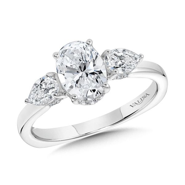 OVAL-CUT & PEAR-ACCENTED THREE-STONE HIDDEN HALO ENGAGEMENT RING W/ DIAMOND ARCH UNDER GALLERY Sanders Jewelers Gainesville, FL